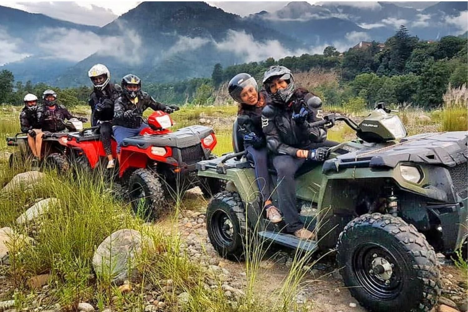 Group enjoying ATV ride in manali mountainous terrain